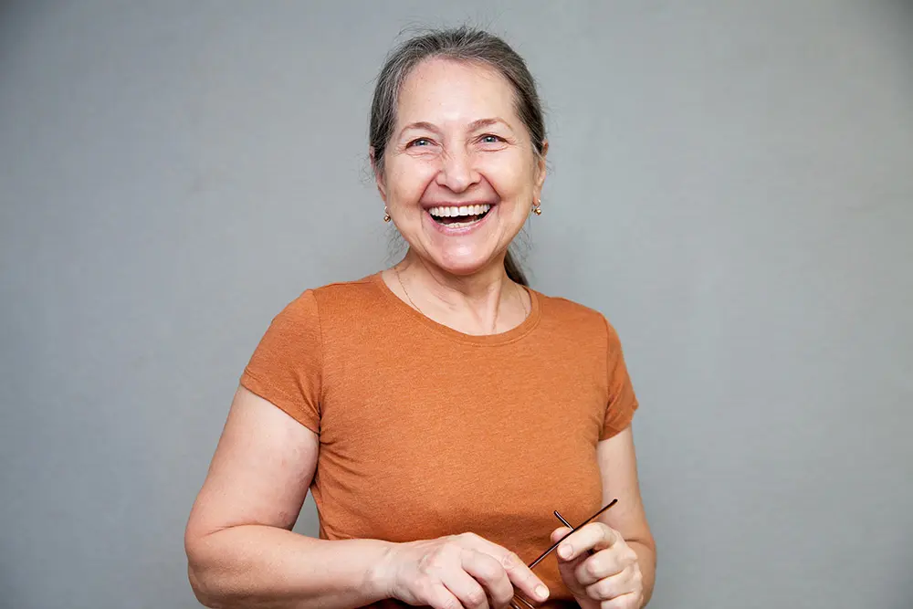 Home 8 Healthy, active looking older woman